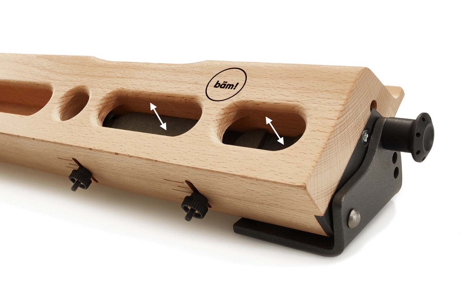 Close-up of the bäm! board pockets with arrows showing how the pocket depth slides between 3 cm and 5 mm